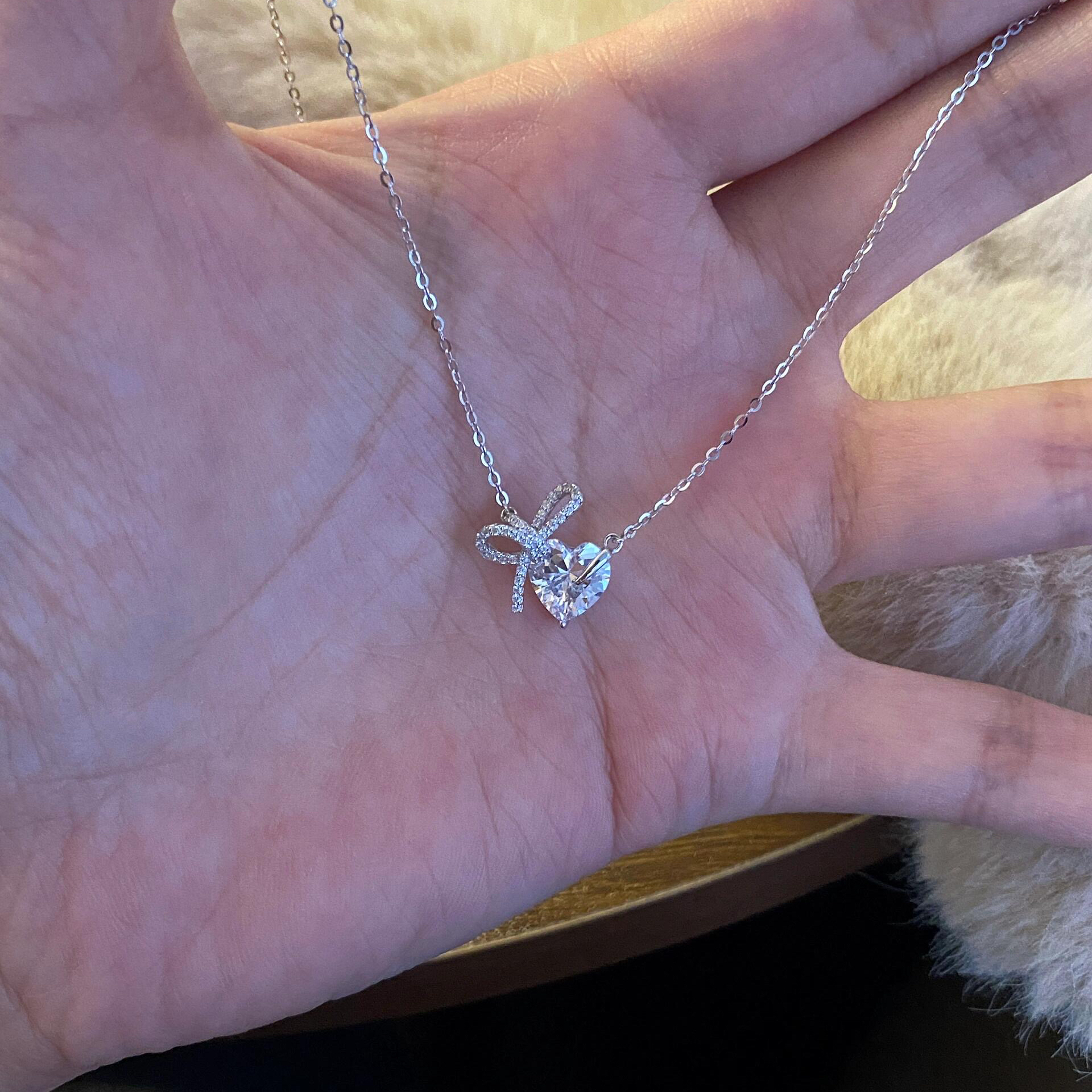 通体 k307爆闪蝴蝶结爱心项链