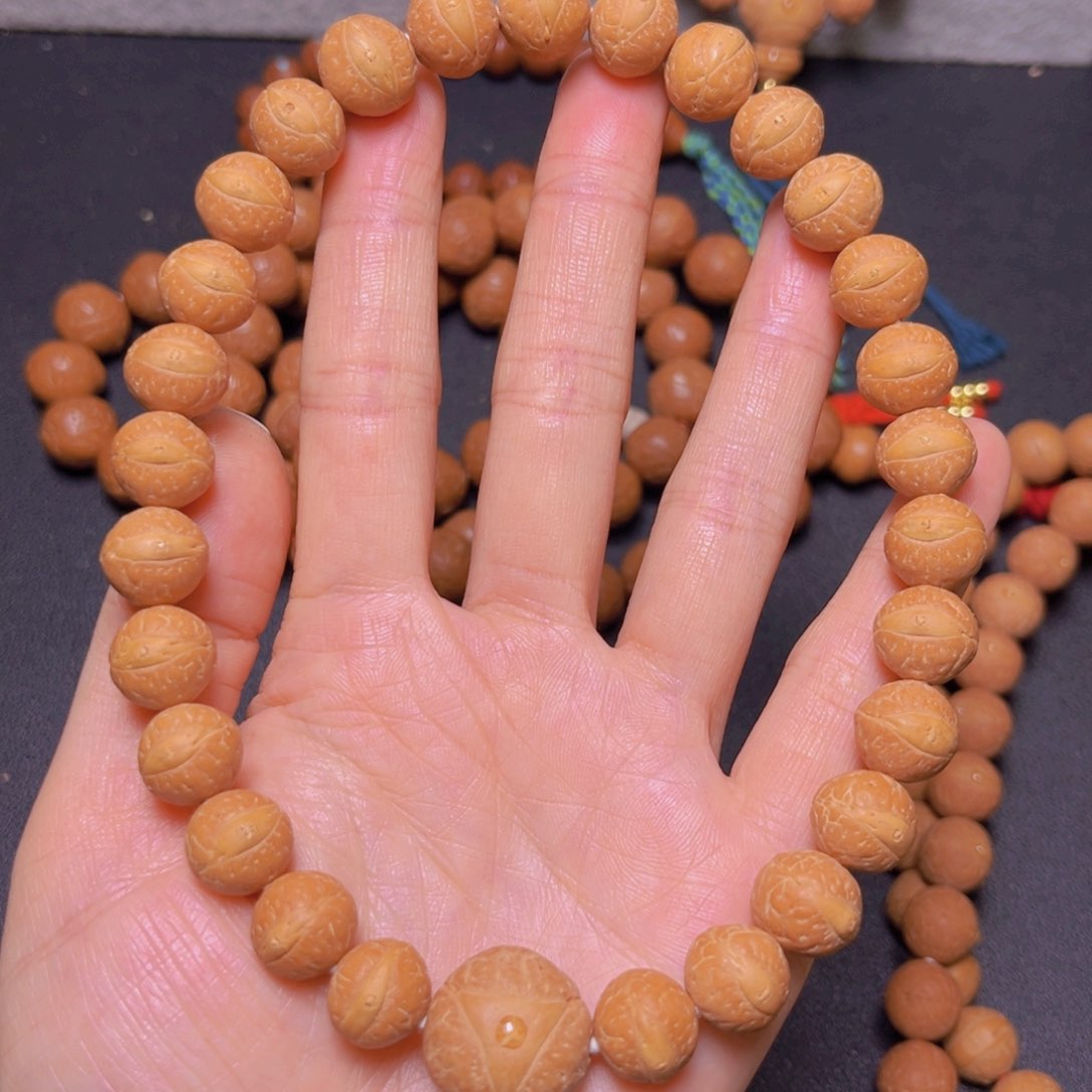 凤眼菩提吊坠12mm精品27颗手持