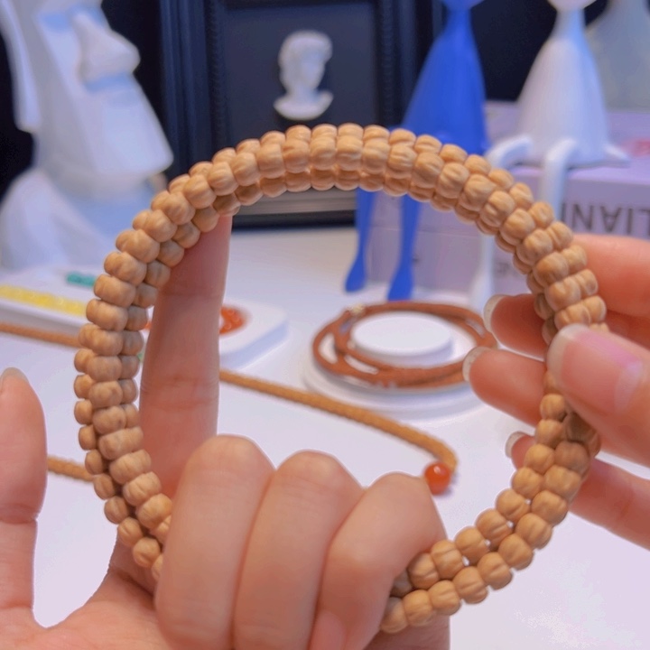 橘****柏香籽/百香籽吊坠