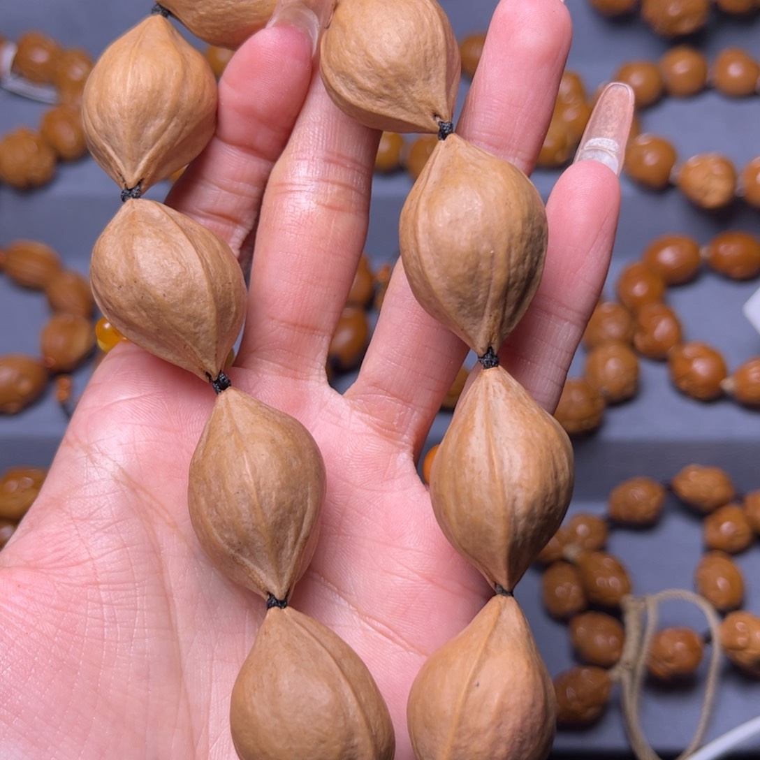 橄榄核吊坠2.1素核手持