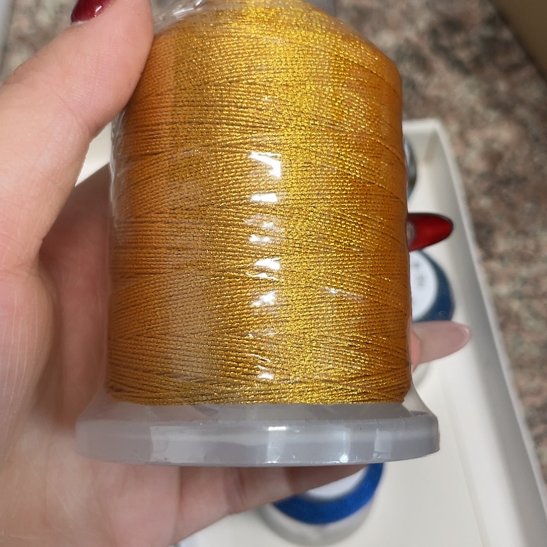 芊***）聚酯纤维3股70克正金2卷