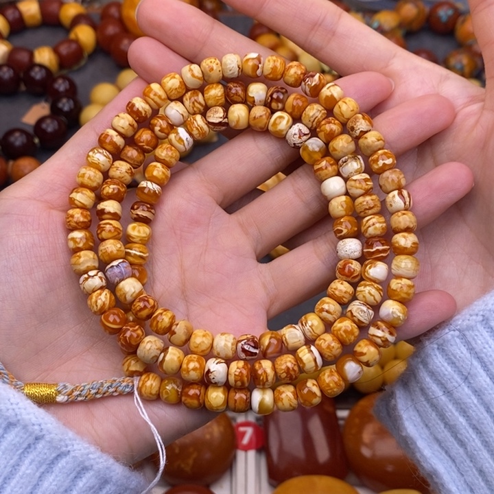 哈***弓琥珀未镶嵌裸石蜜蜡M