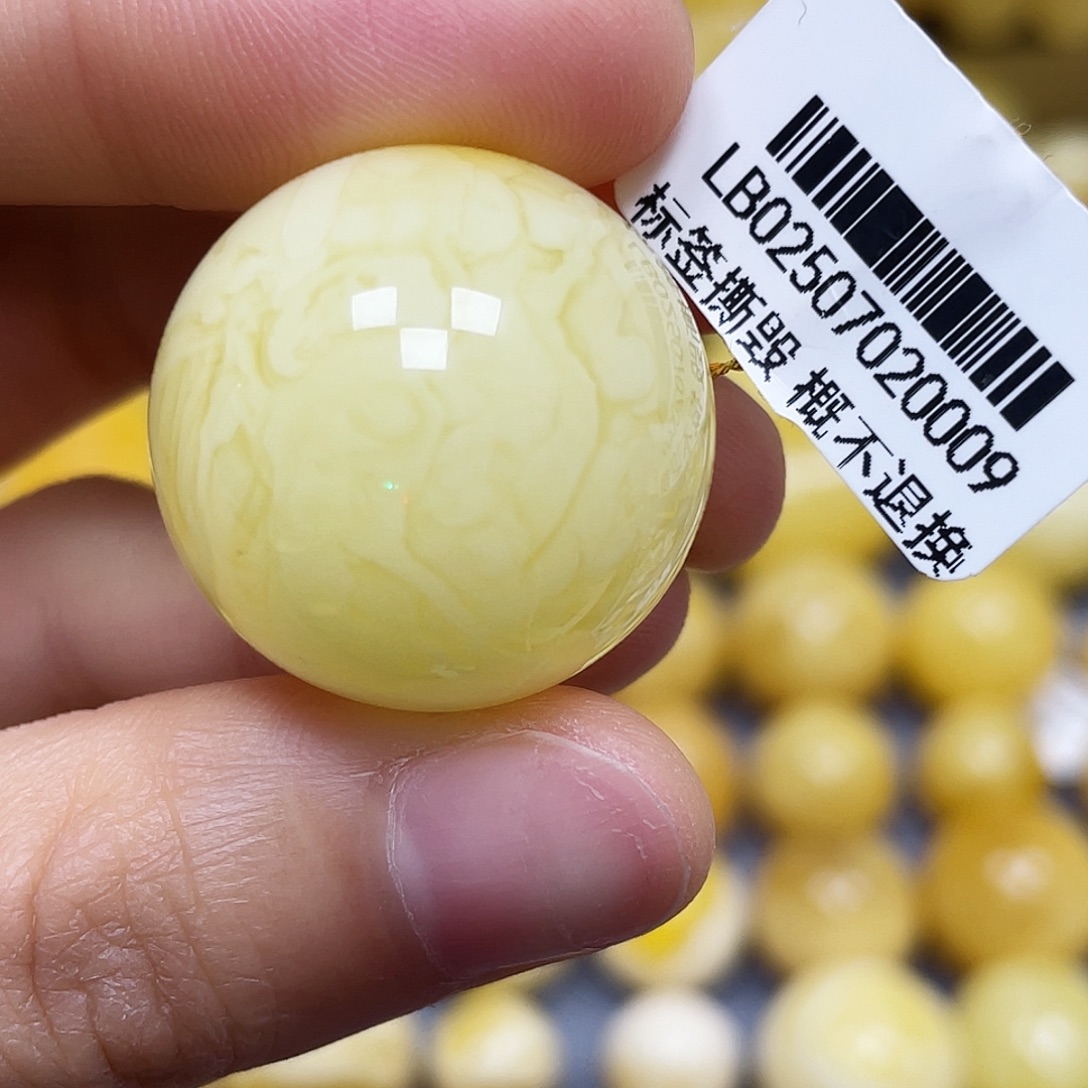 蜜蜡未镶嵌裸石24.7mm.瑕