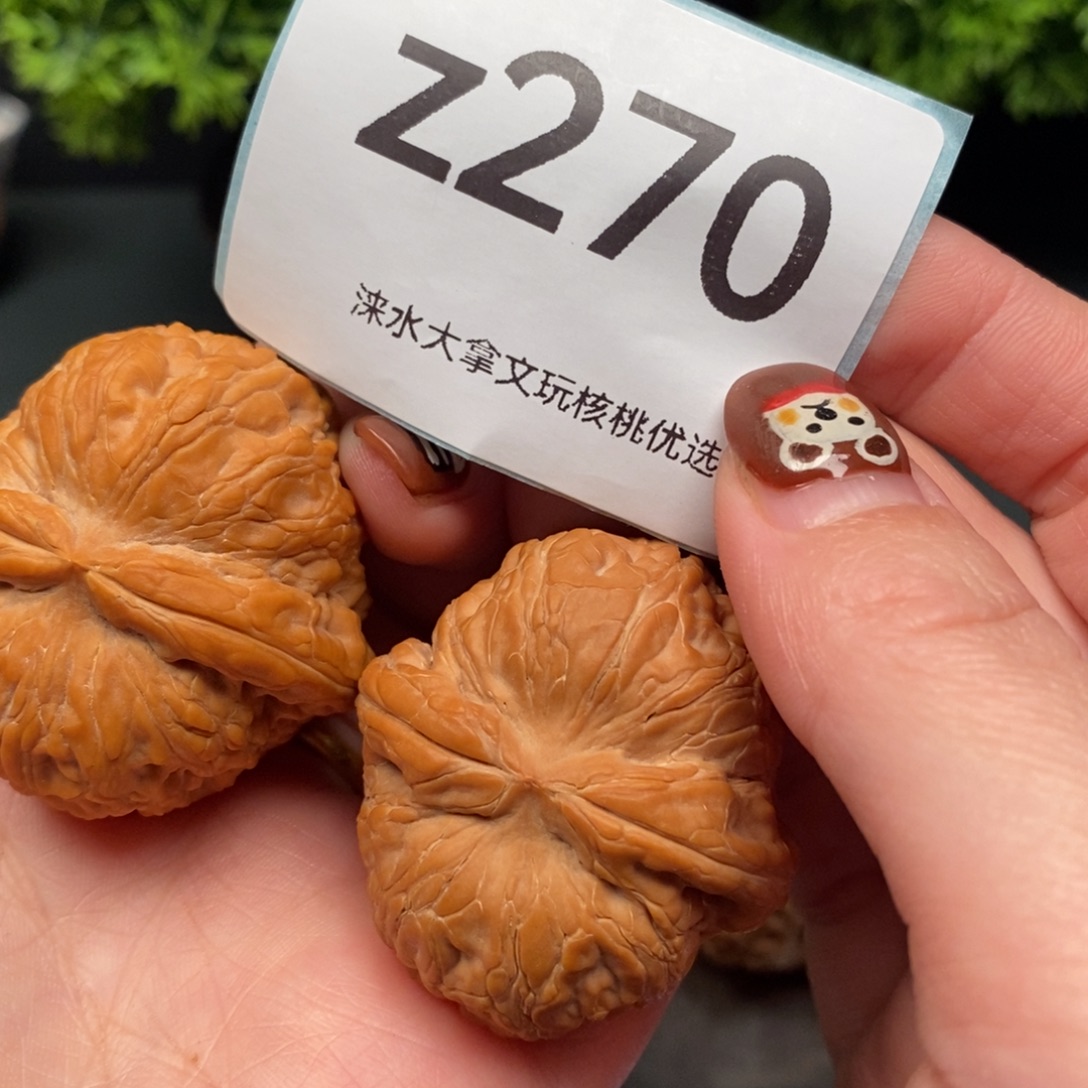 黄***马文玩核桃把件550       270