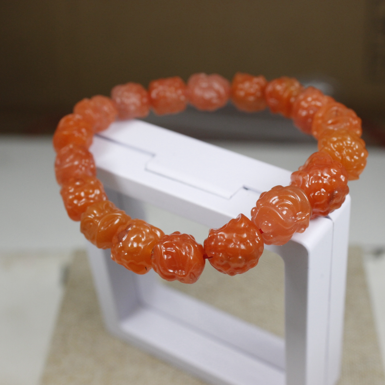 南红玛瑙保真柿子红微瑕醒狮梅花雕刻手串手链杂裂