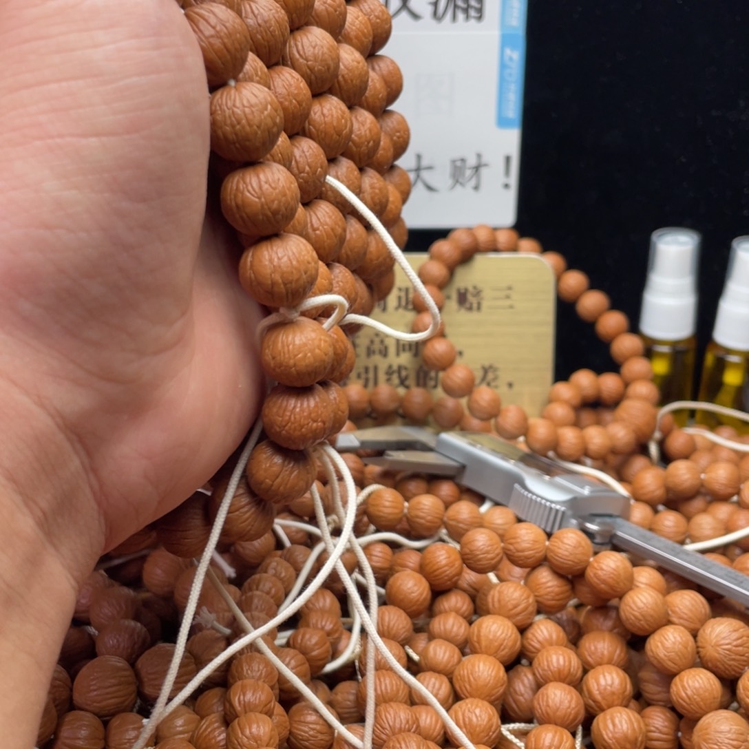 猴头核桃吊坠凤羽手持