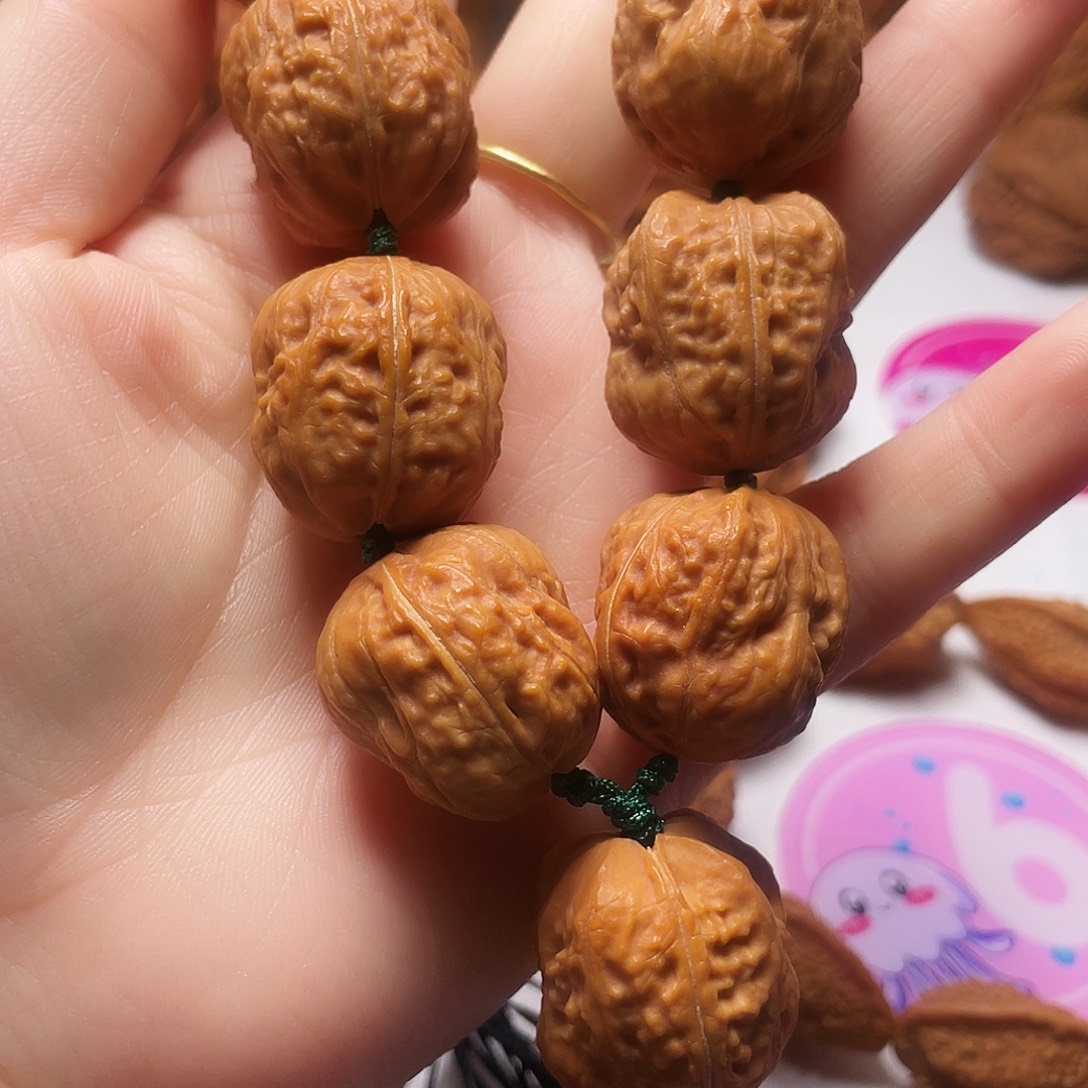 青***木文玩核桃吊坠寿星头