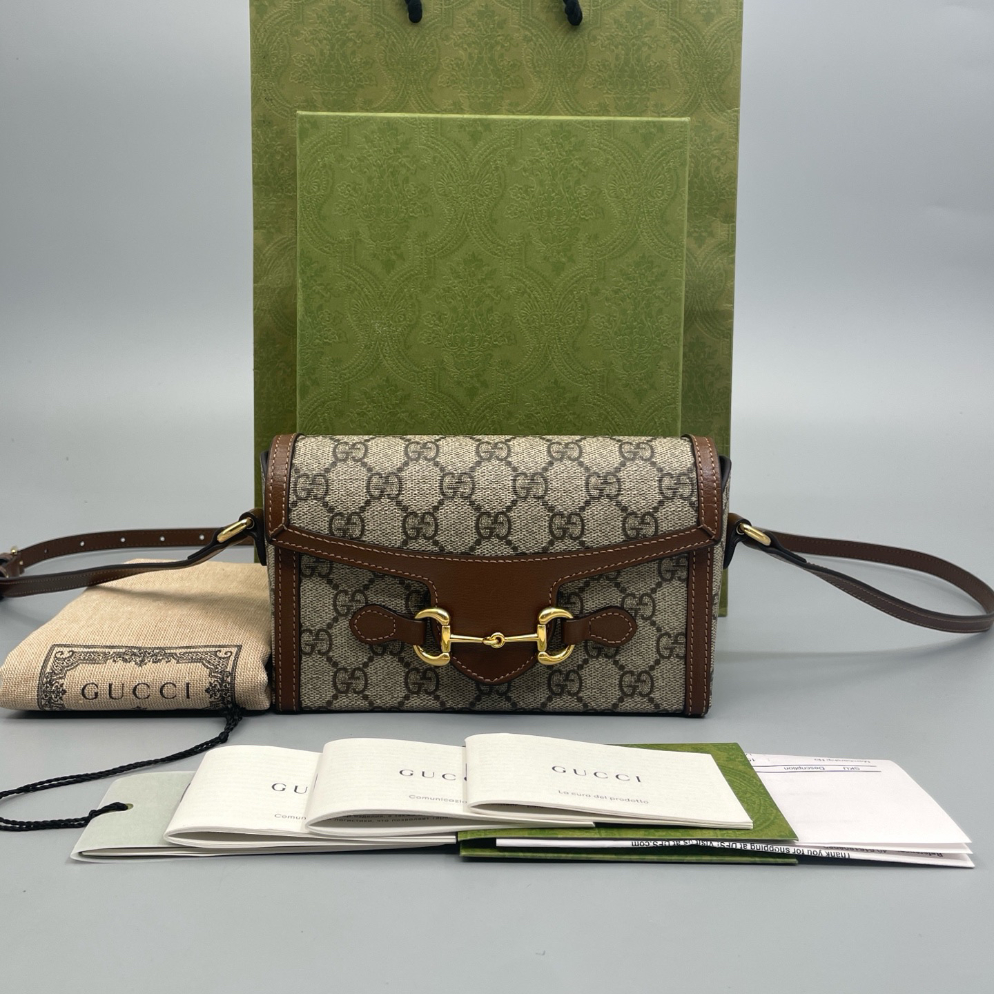 95新 GUCCI/古驰 1955系列老花横版手机包斜挎包 尺寸18*12 A3829