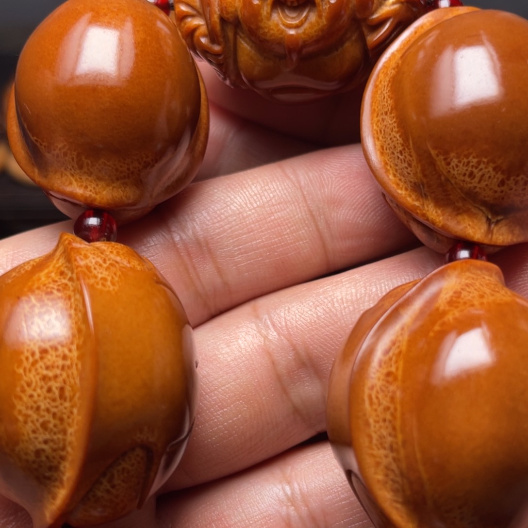 橄榄核手串/手链元宝富甲手持一条3.3左右