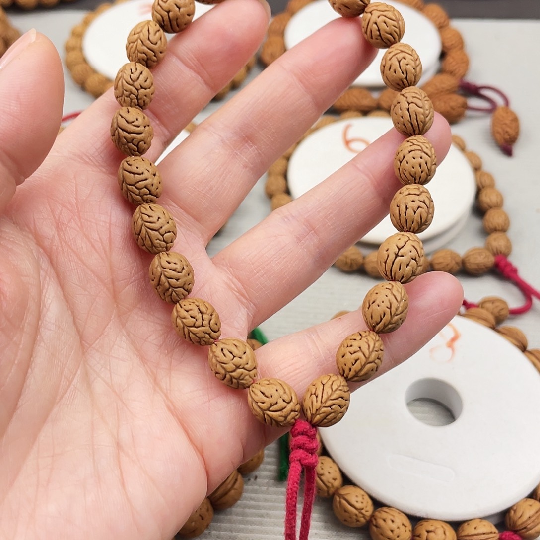 C***0.94尺寸野生桃核手持