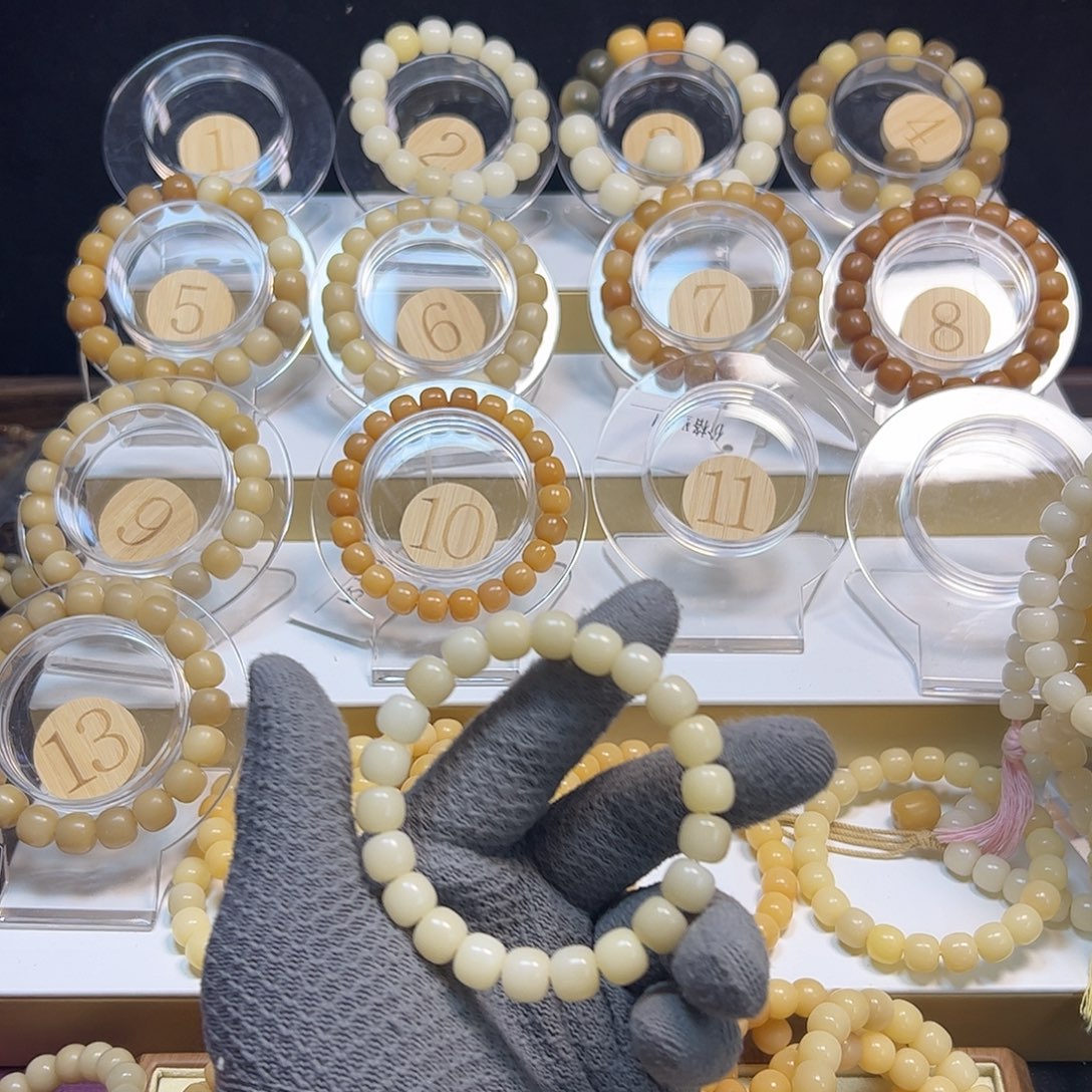 艾***艾菩提根/象牙果吊坠12×11白色桶珠砂纸干磨单圈福利