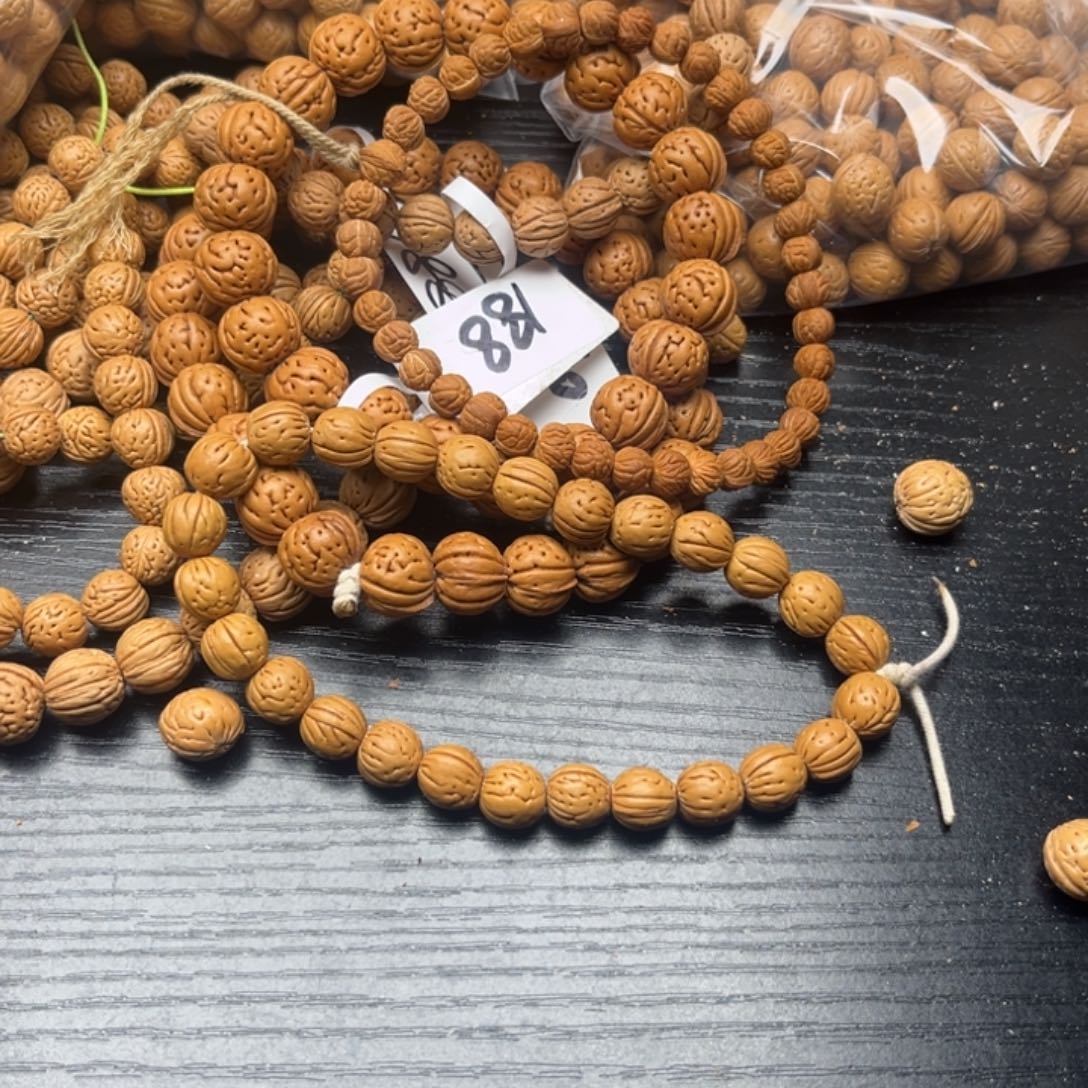 ـ***业文玩核桃吊坠下端核散籽批发