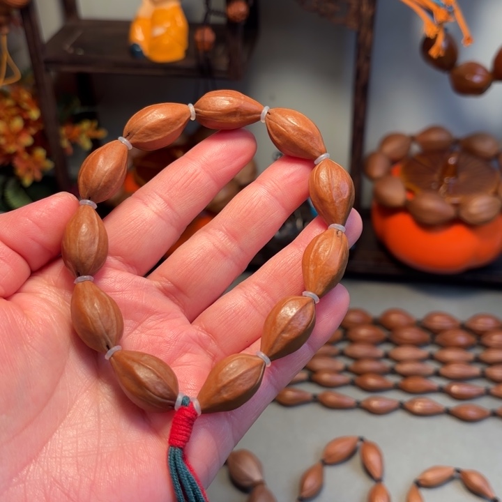 杨***串橄榄核手串/手链爆红老料小红核12×21