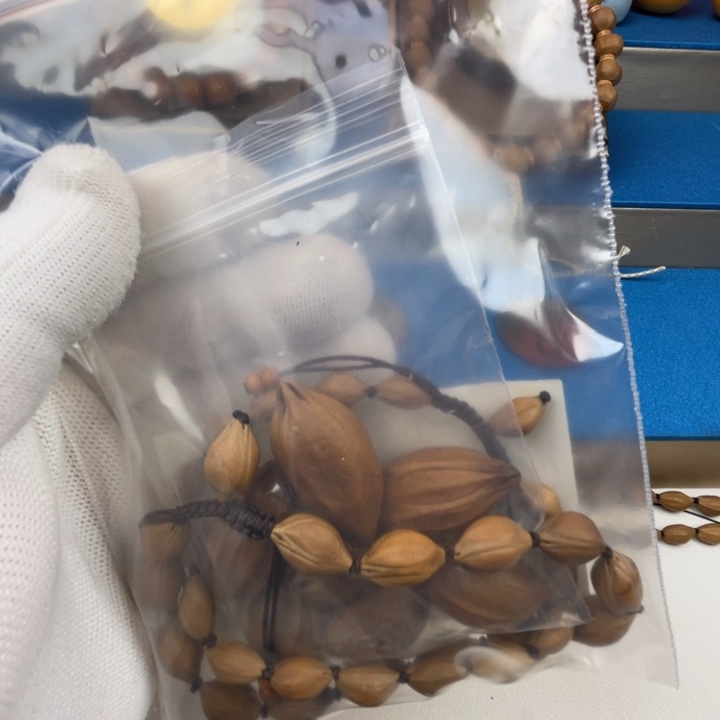 漳***巅橄榄核手串闪电购2