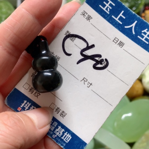 蛇纹石玉手把件未镶嵌