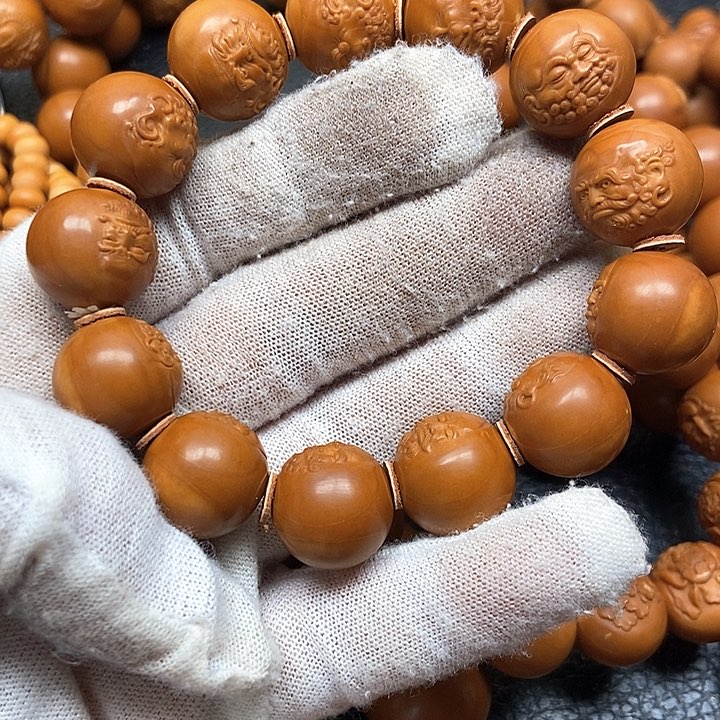 读*橄榄核正圆光珠雕刻达魔1.6