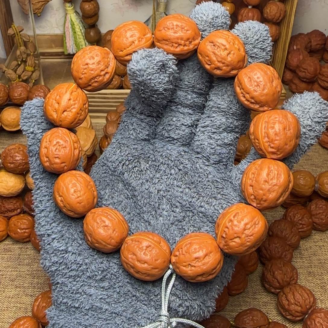 文玩核桃吊坠红皮钱袋子手持21.22.22