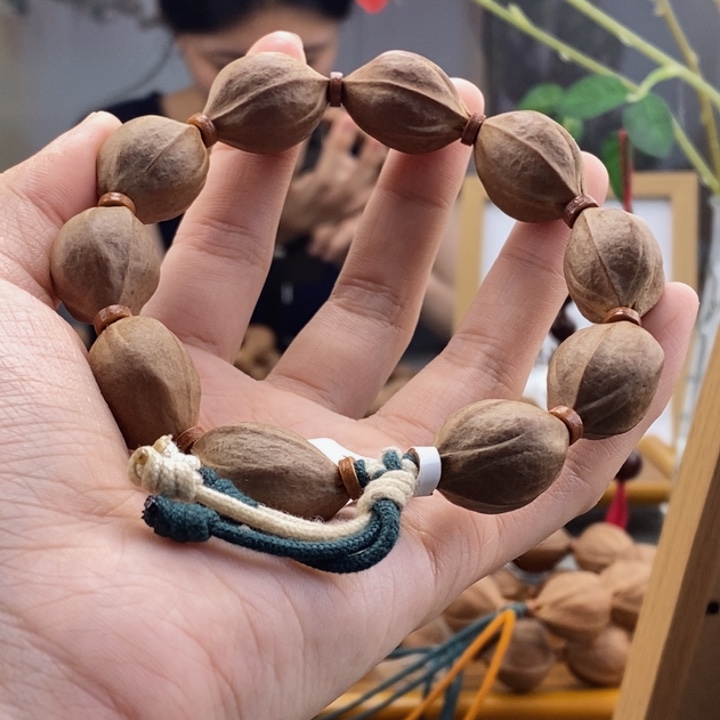 吊坠橄榄核镜***己梅林铁