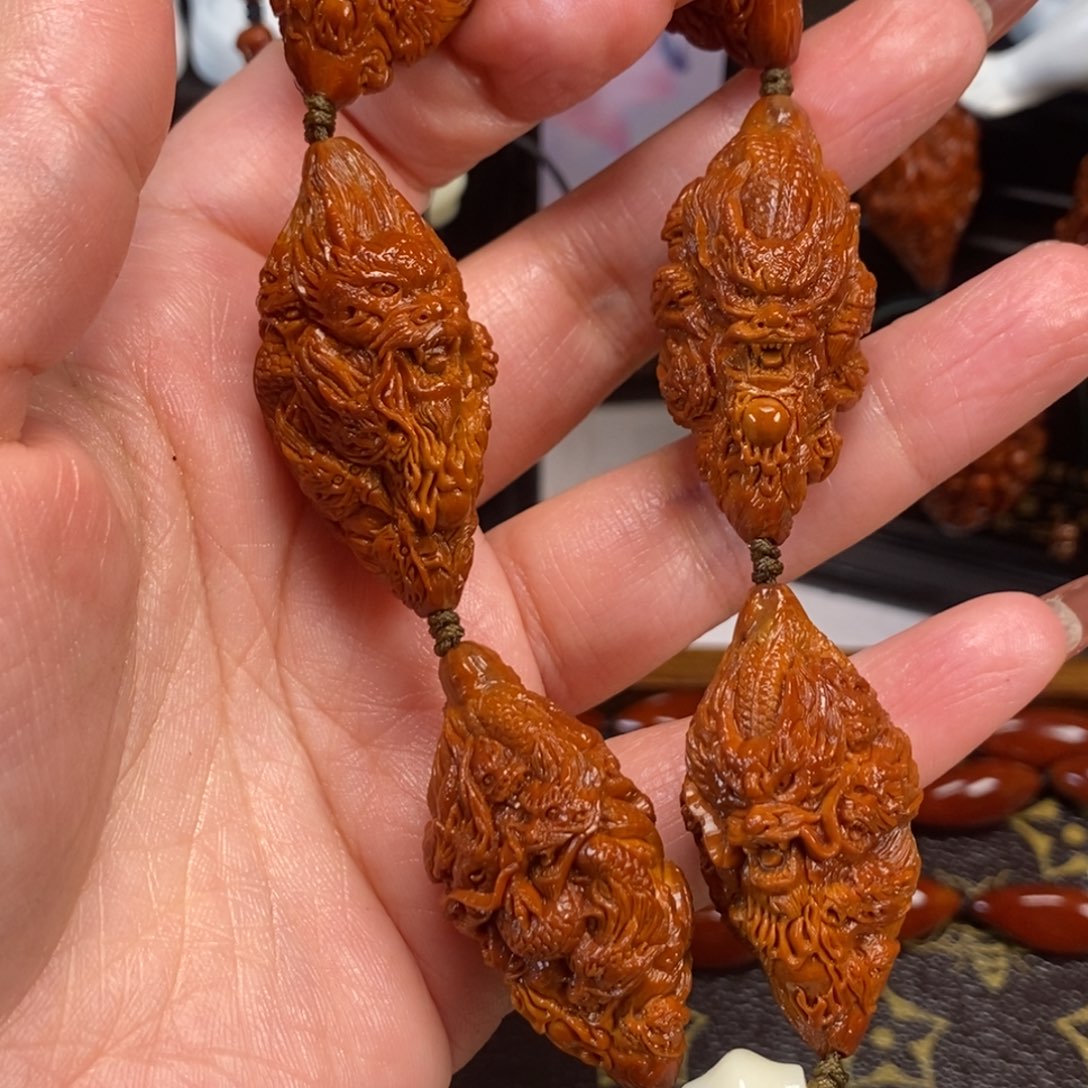 飞***号橄榄核吊坠九龙手持1111
