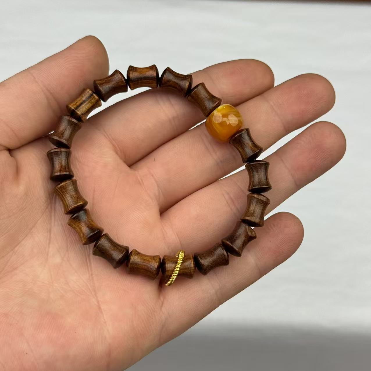 黑花梨竹节0.6*1.0手串+金属跑环+黄珠（无礼盒）K100