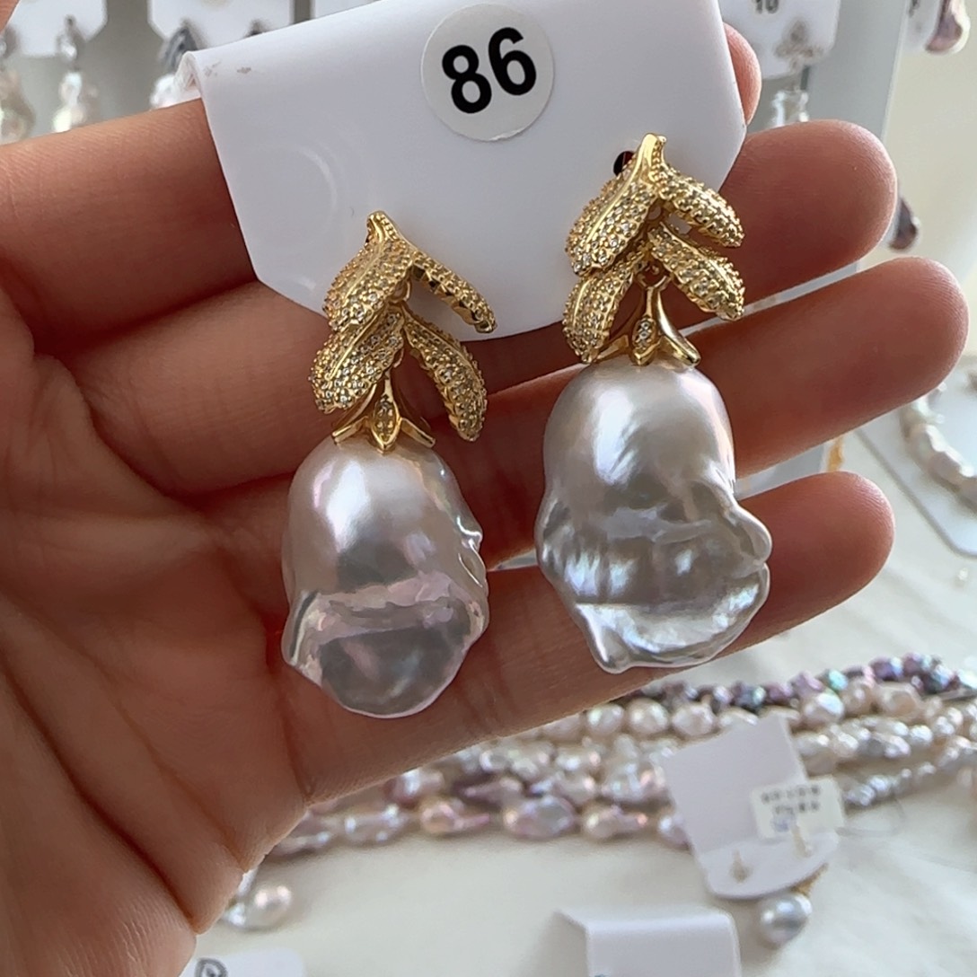 淡水珍珠耳饰银S925镶嵌悠**得