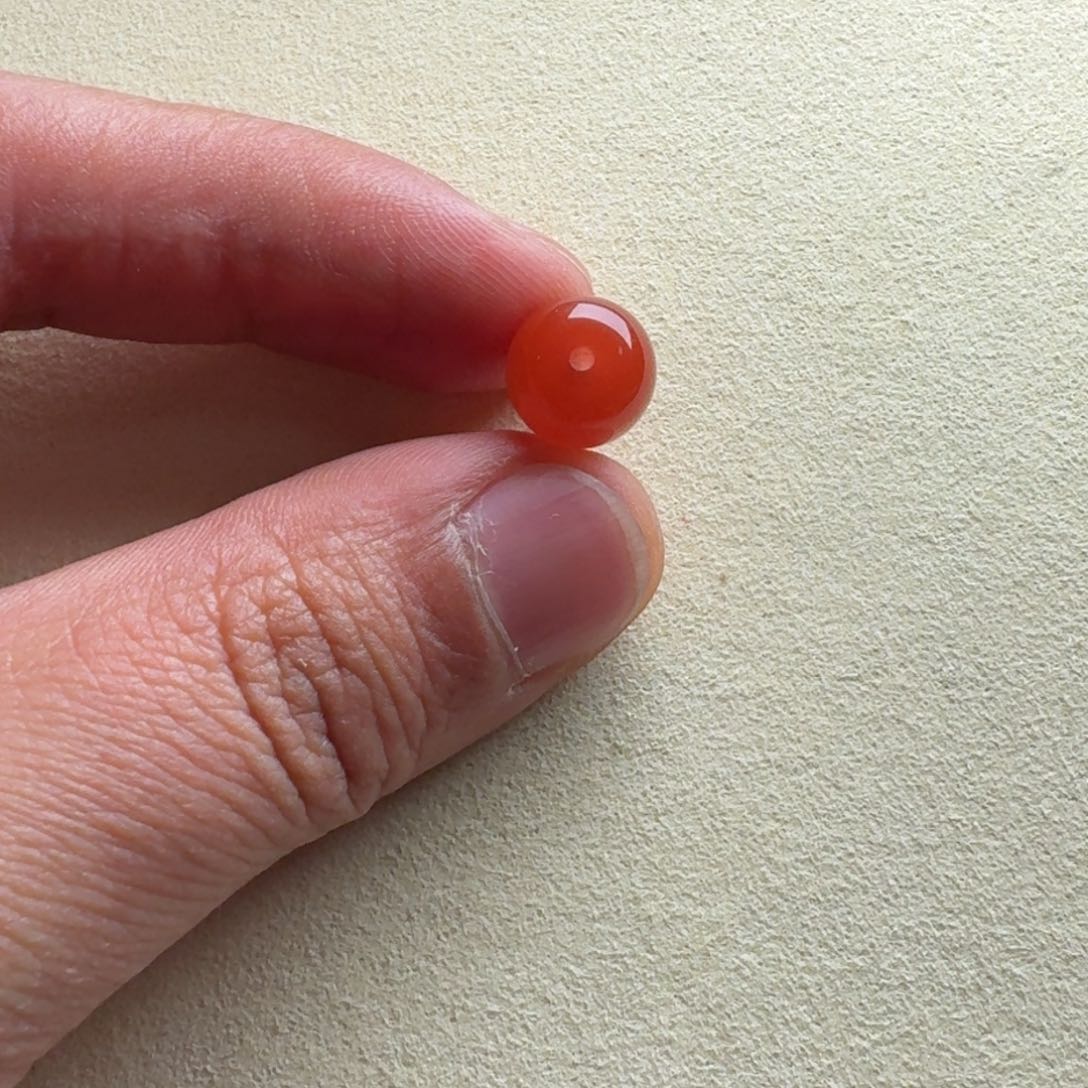 南红玛瑙老型10.3*9.2孔道有马牙未镶嵌