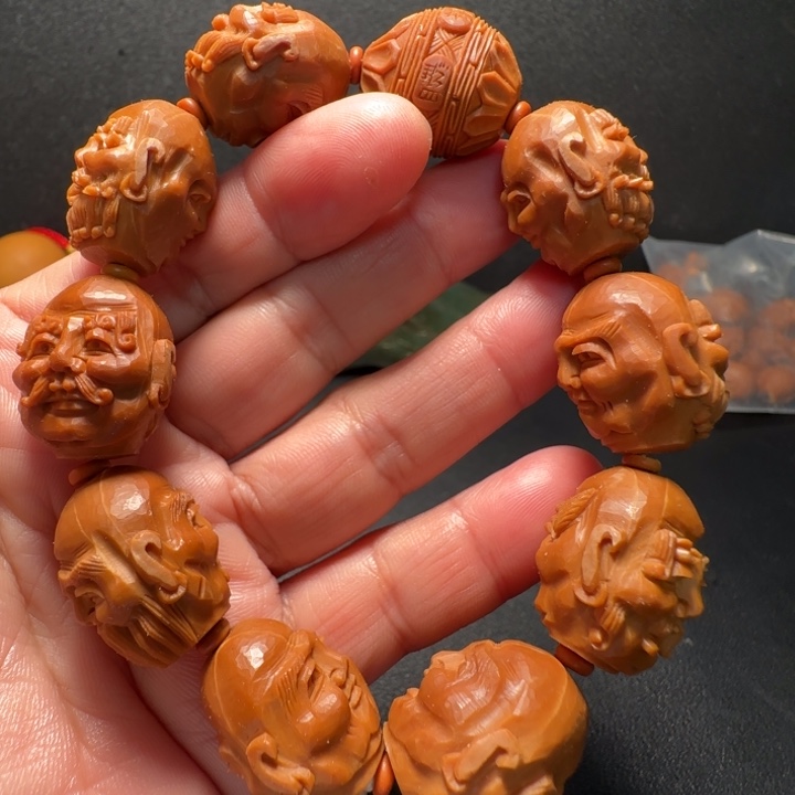 橄榄核吊坠须派罗汉