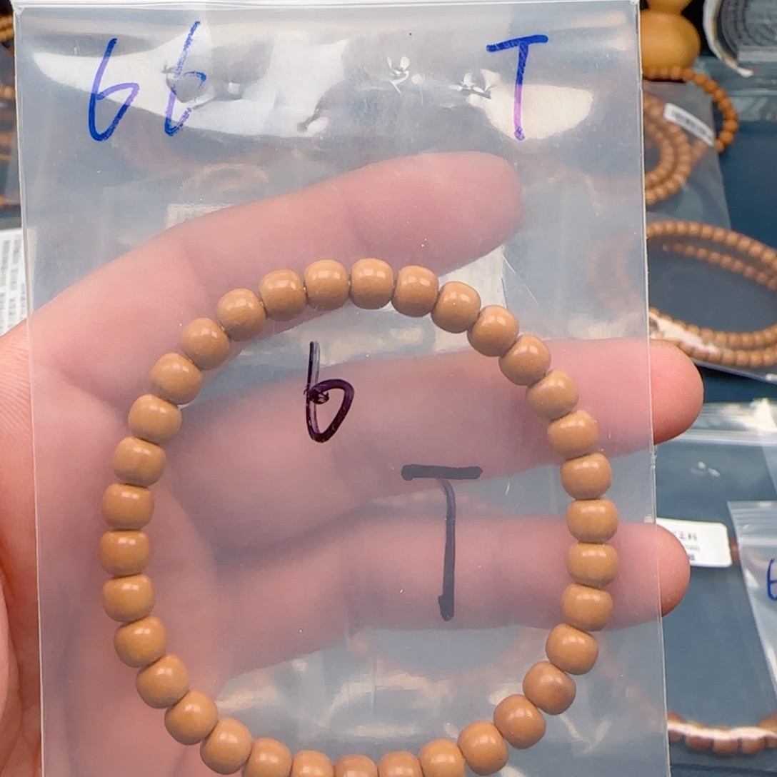 橄榄核手串老挝SS级核尖极限弧尺寸6.6全无白特价