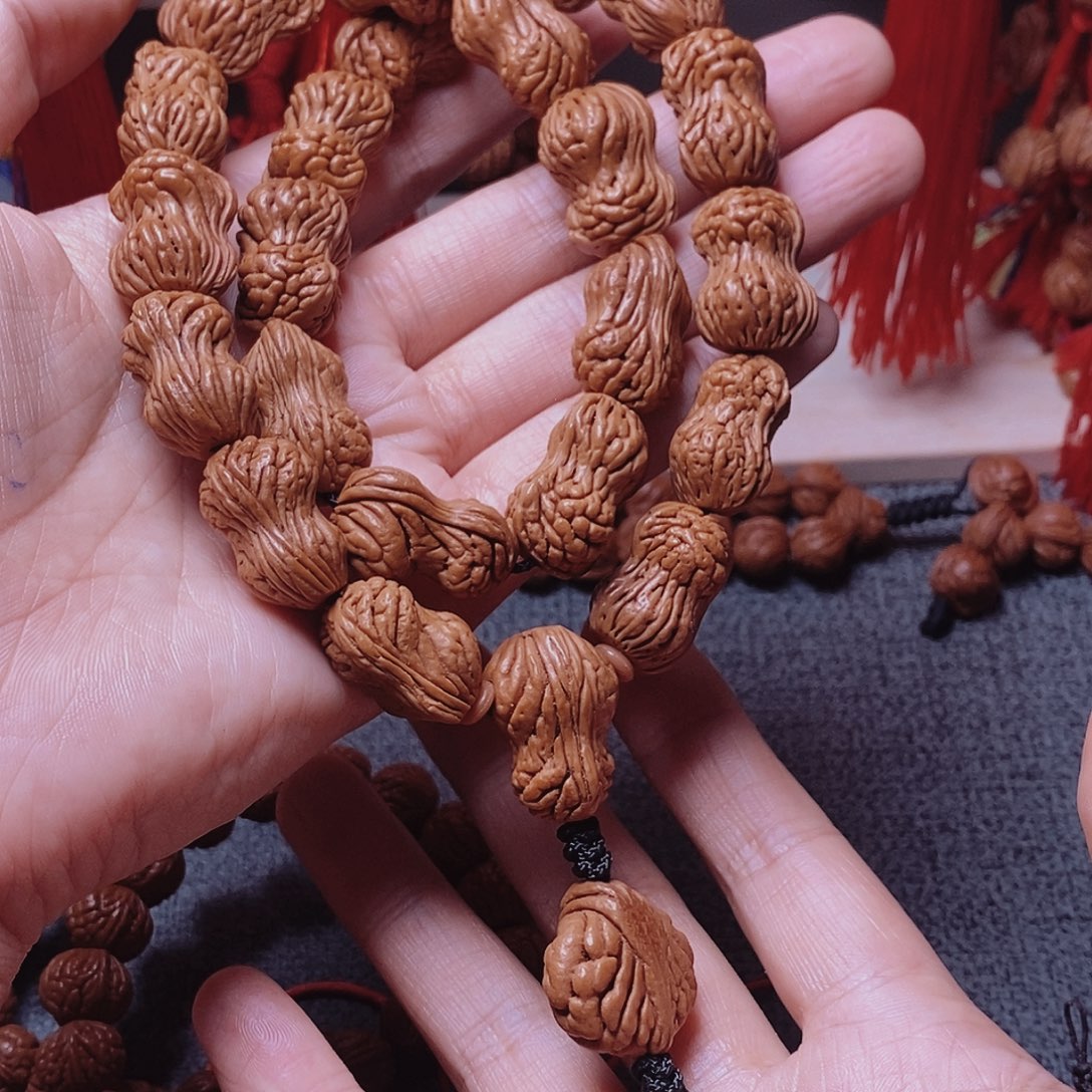 桃核吊坠桃枭手持