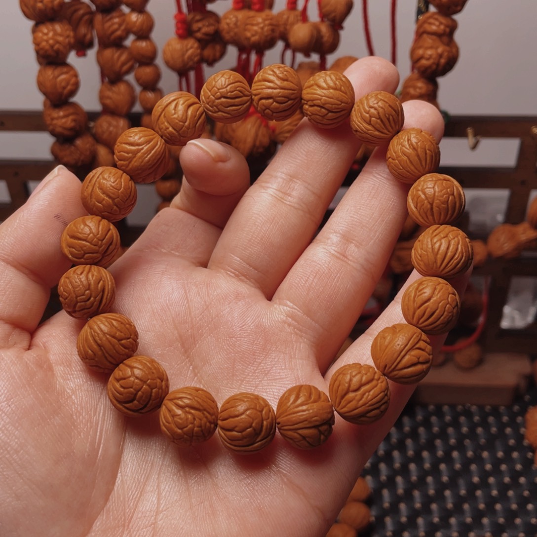 木质类龙纹桃枭手串