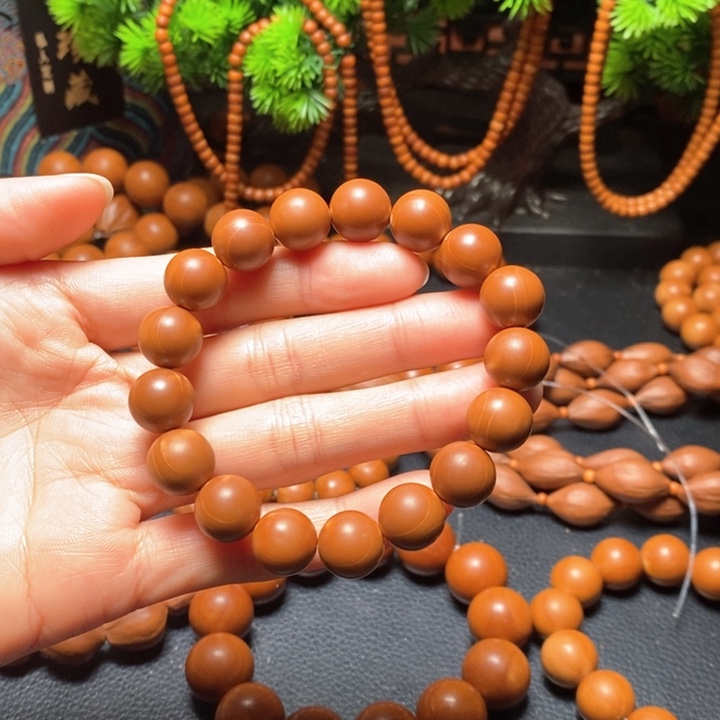 橄榄核手串1.25尺寸红料