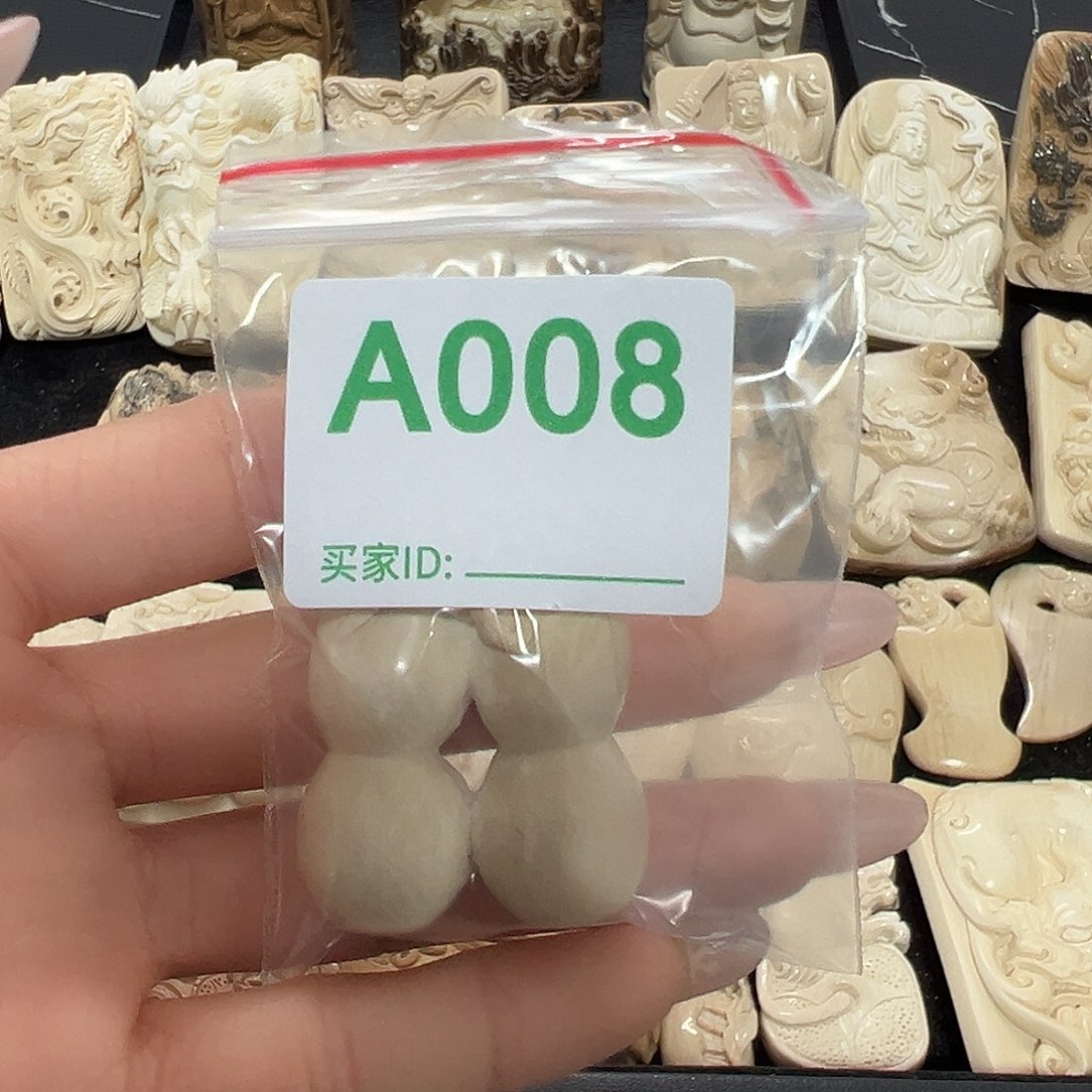 胡***理天然猛犸牙雕刻品