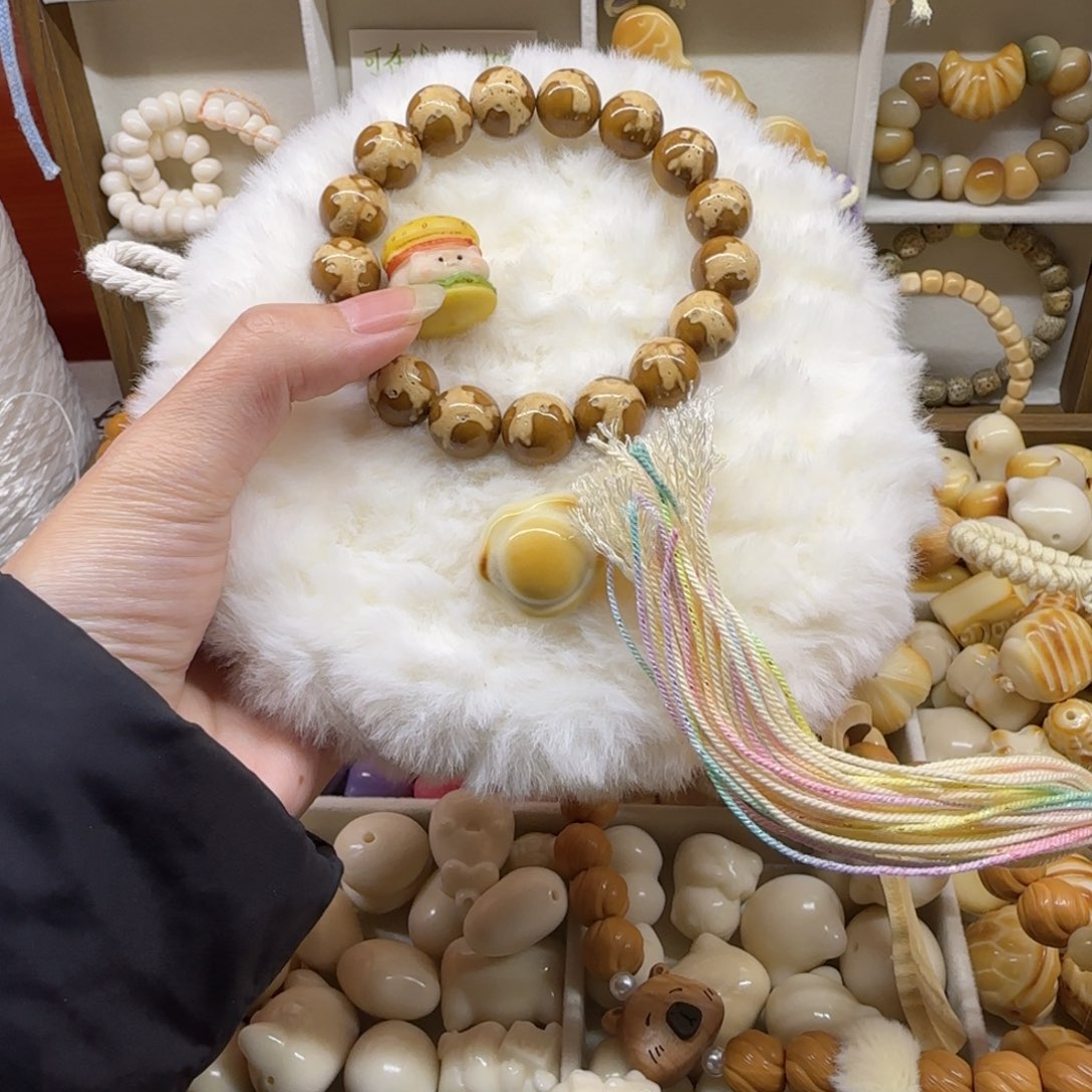 欣***宁202 熊猫紫金鼠手串的配件加流苏