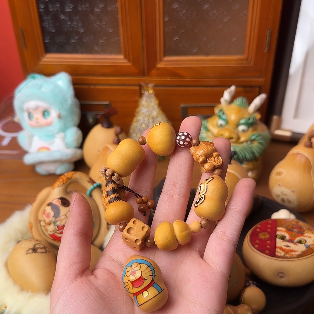 楠****木浣熊手持手串不退换