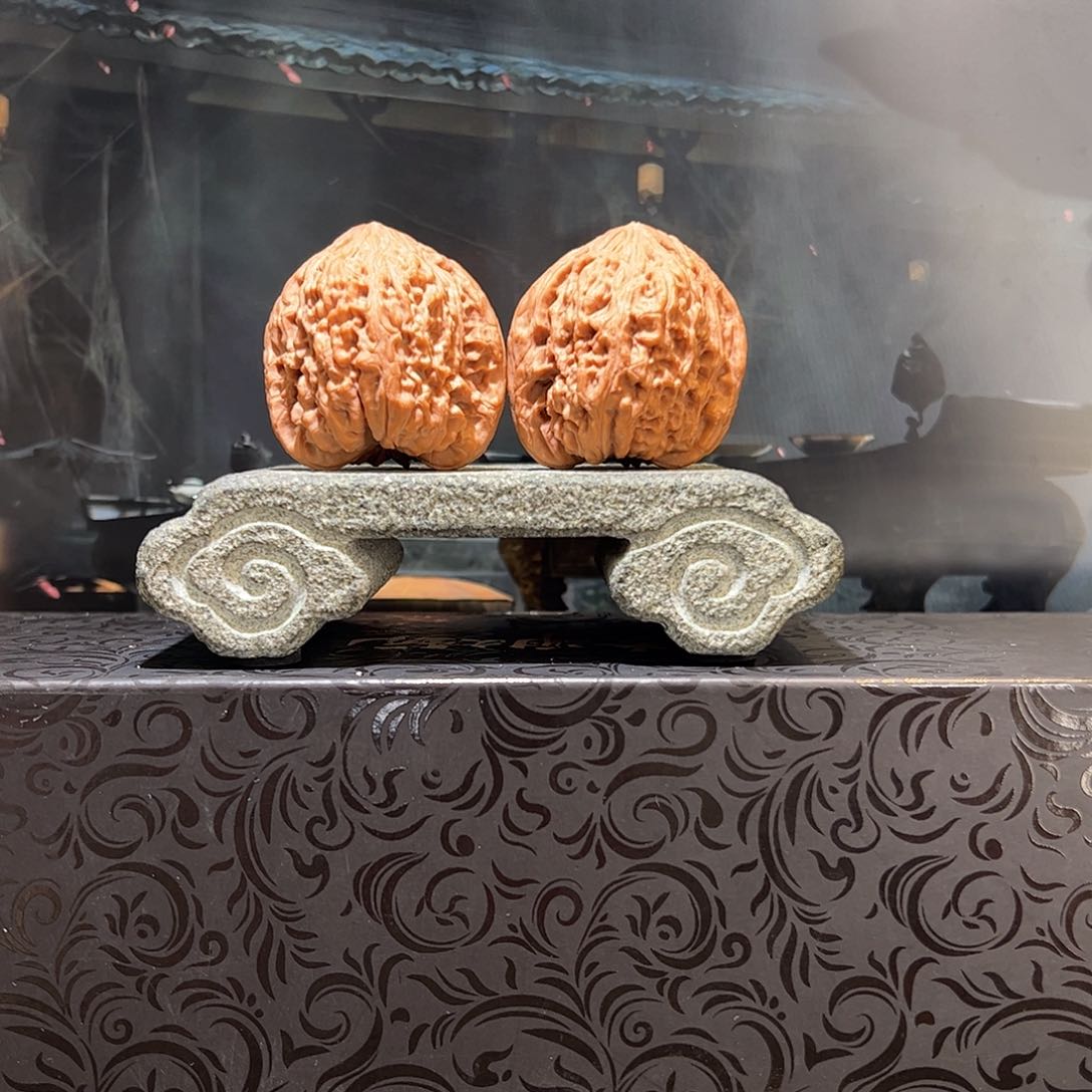 桃核把件刘志瑞橘皮南将石030310