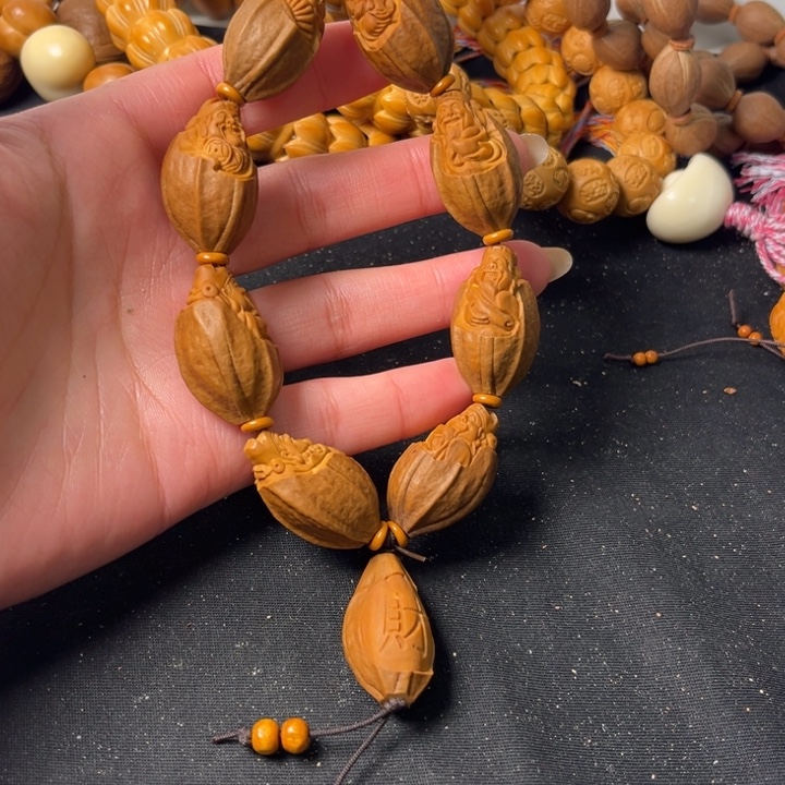 橄榄核手串包衣财神