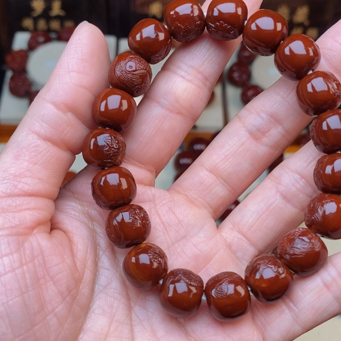 橄榄核吊坠甜****’连年有余