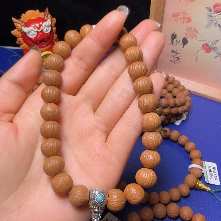 小***)猴头核桃手串凤羽