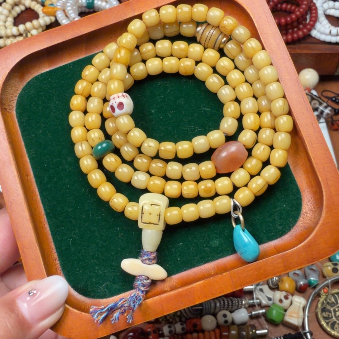 起***舞树脂制品念珠配饰