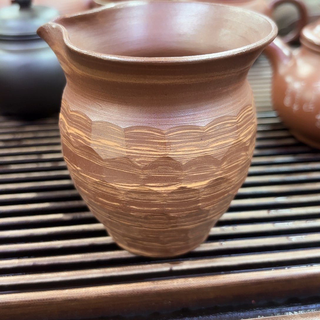 罐钦州坭兴陶绞泥公道杯