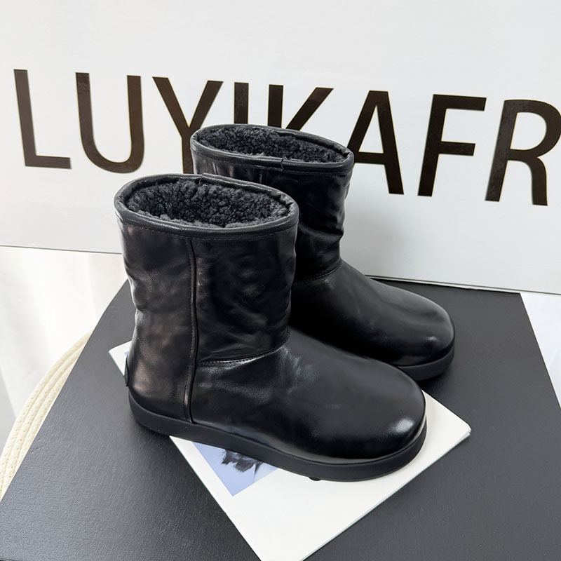  零下30°保暖羊皮毛一体雪地靴女黑色真皮厚底防水防滑东北短靴子