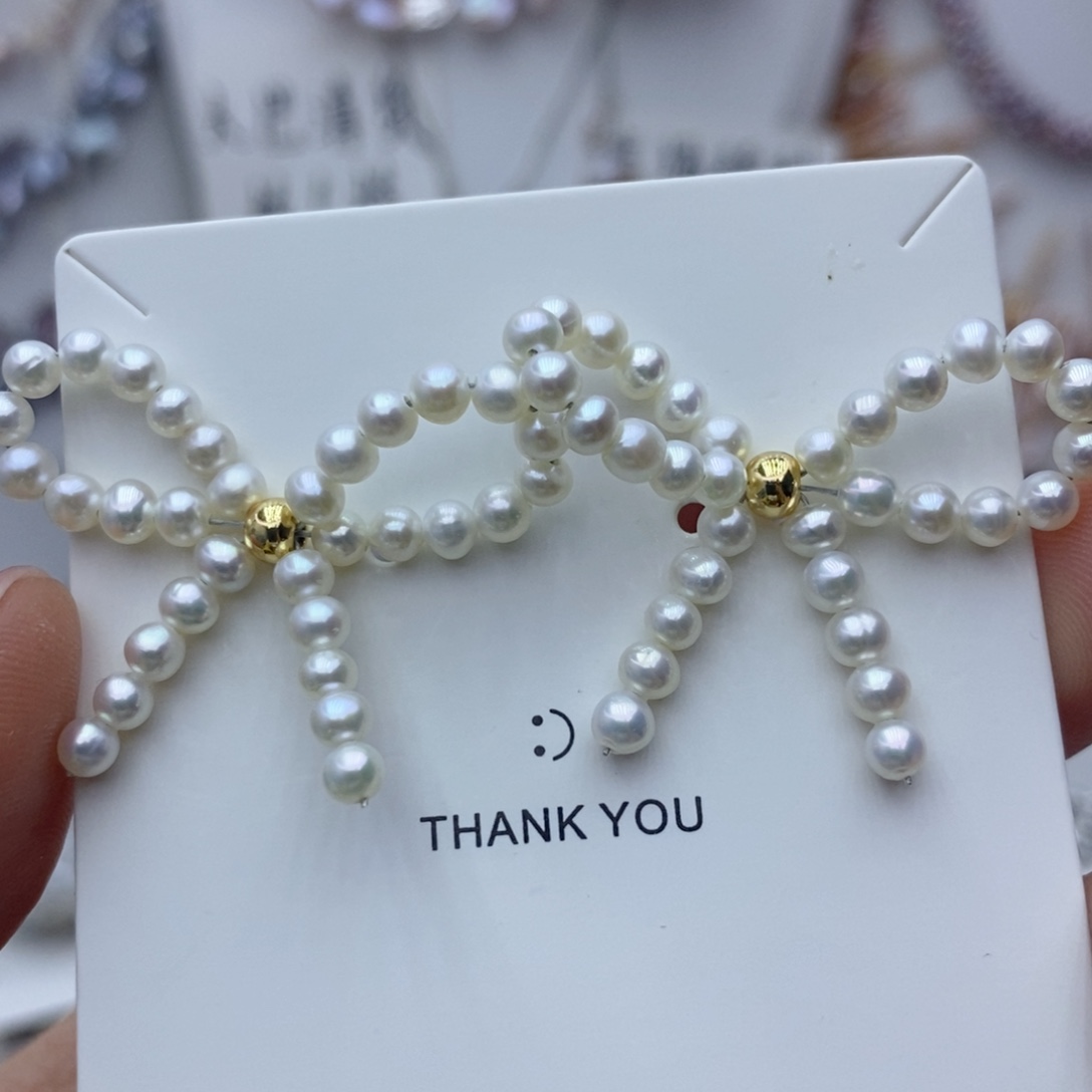 淡水珍珠银S925镶嵌耳饰