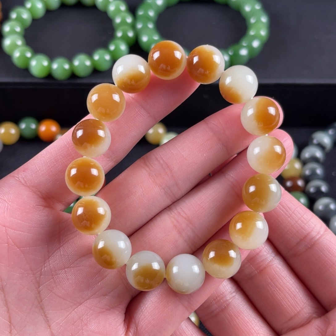 和田玉手串未镶嵌洪*卡12金山糖白