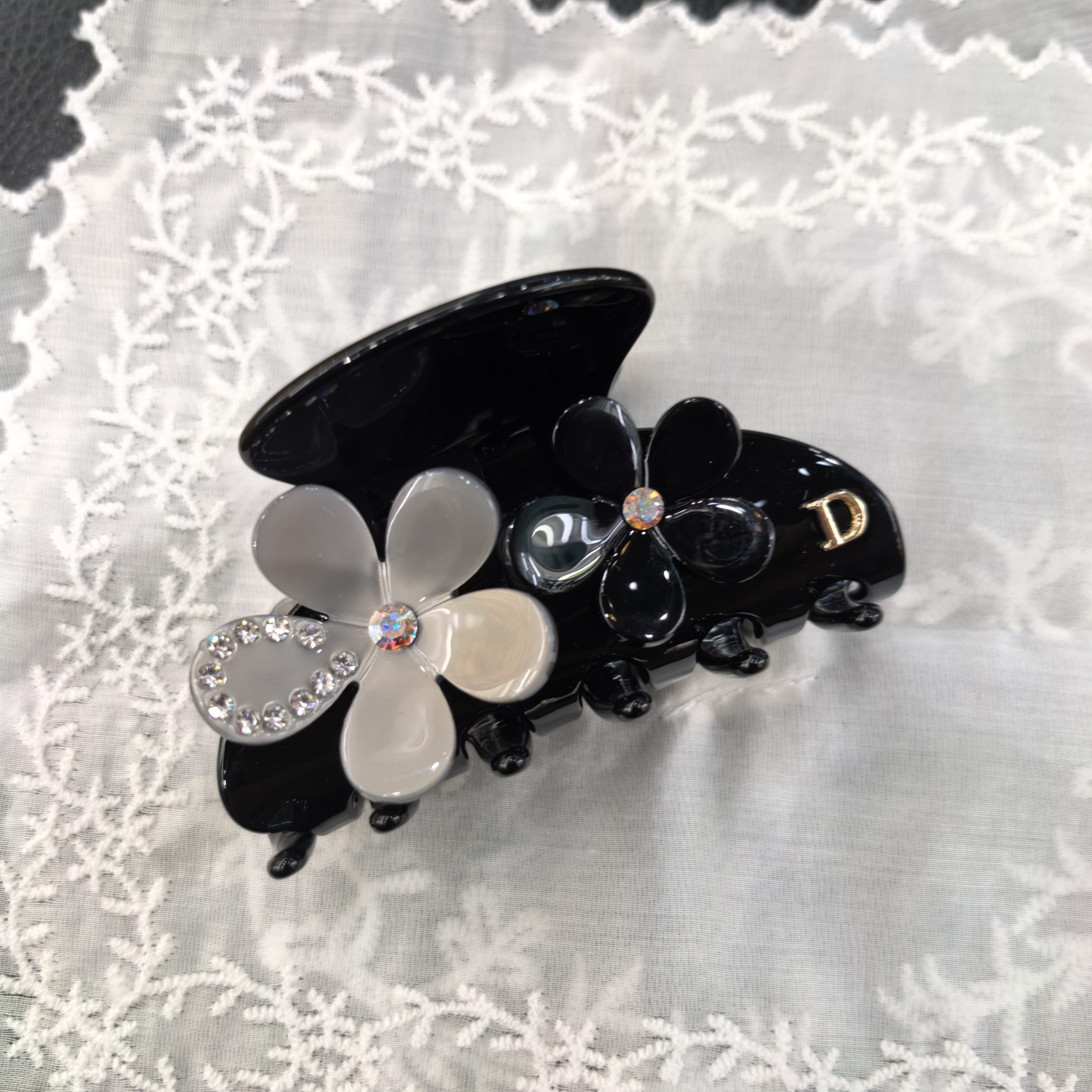 D302黑灰色双花朵闪闪高级酸酸款抓夹