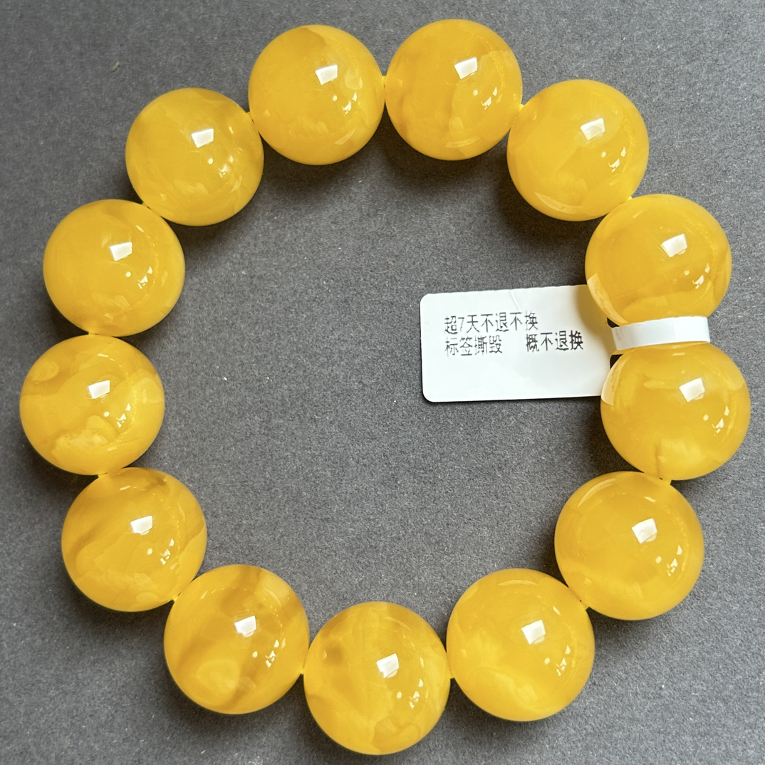 精品焦皮料满蜜鸡油红手串