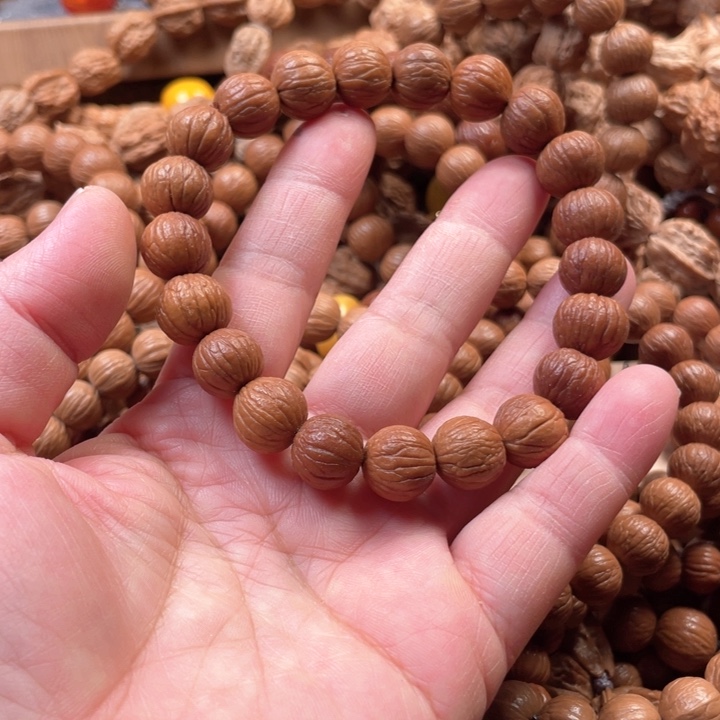 猴头核桃手串1.2泛油风羽