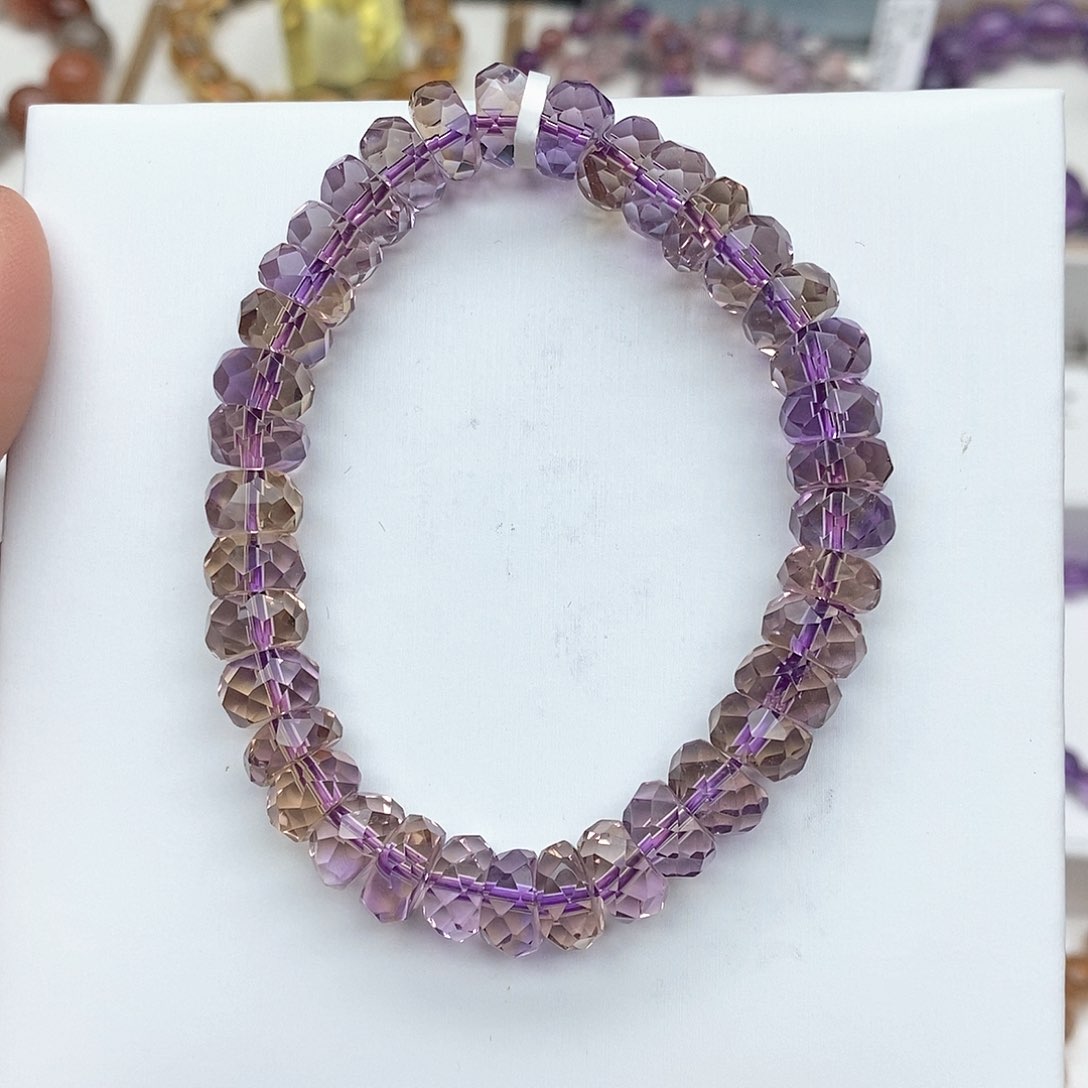 水晶手链未镶嵌九**几紫黄共体算盘珠9