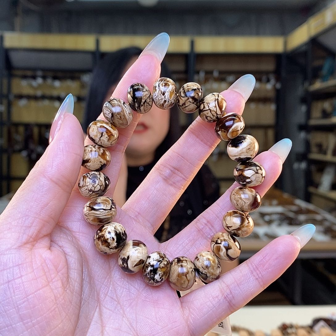 未镶嵌琥珀裸石物**应12m花珀