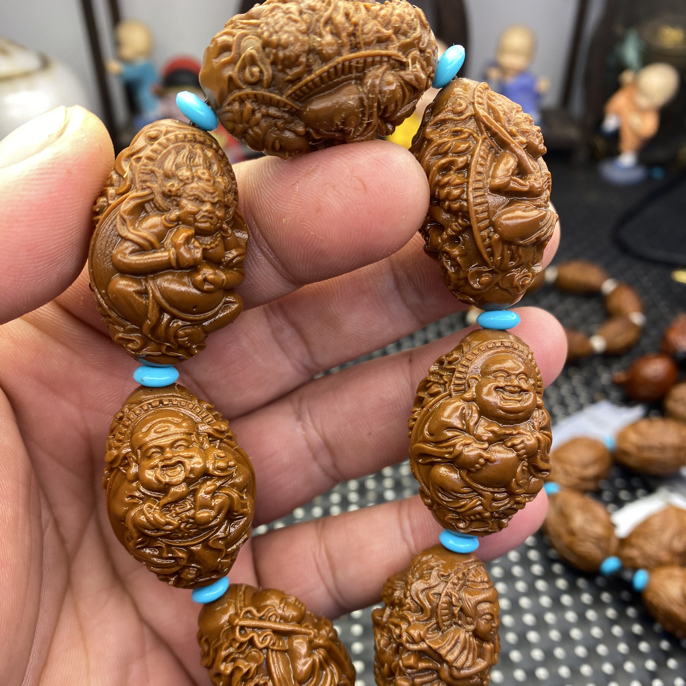 得奖的2.3.御龙万佛朝宗雕刻手串是沉水核不是橄榄核黄金树沉水核