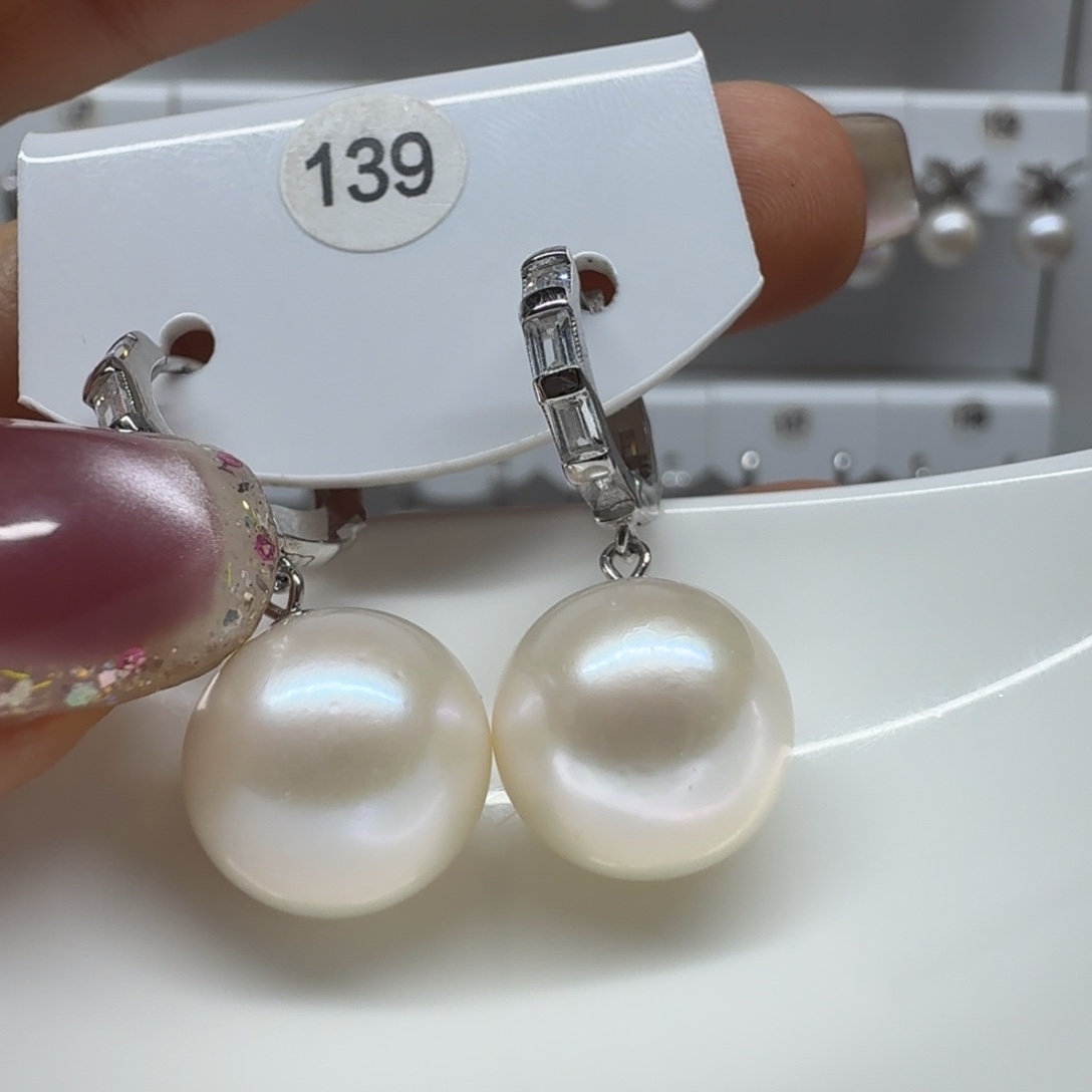 羊***羊淡水珍珠银S925镶嵌耳饰珍珠12.4